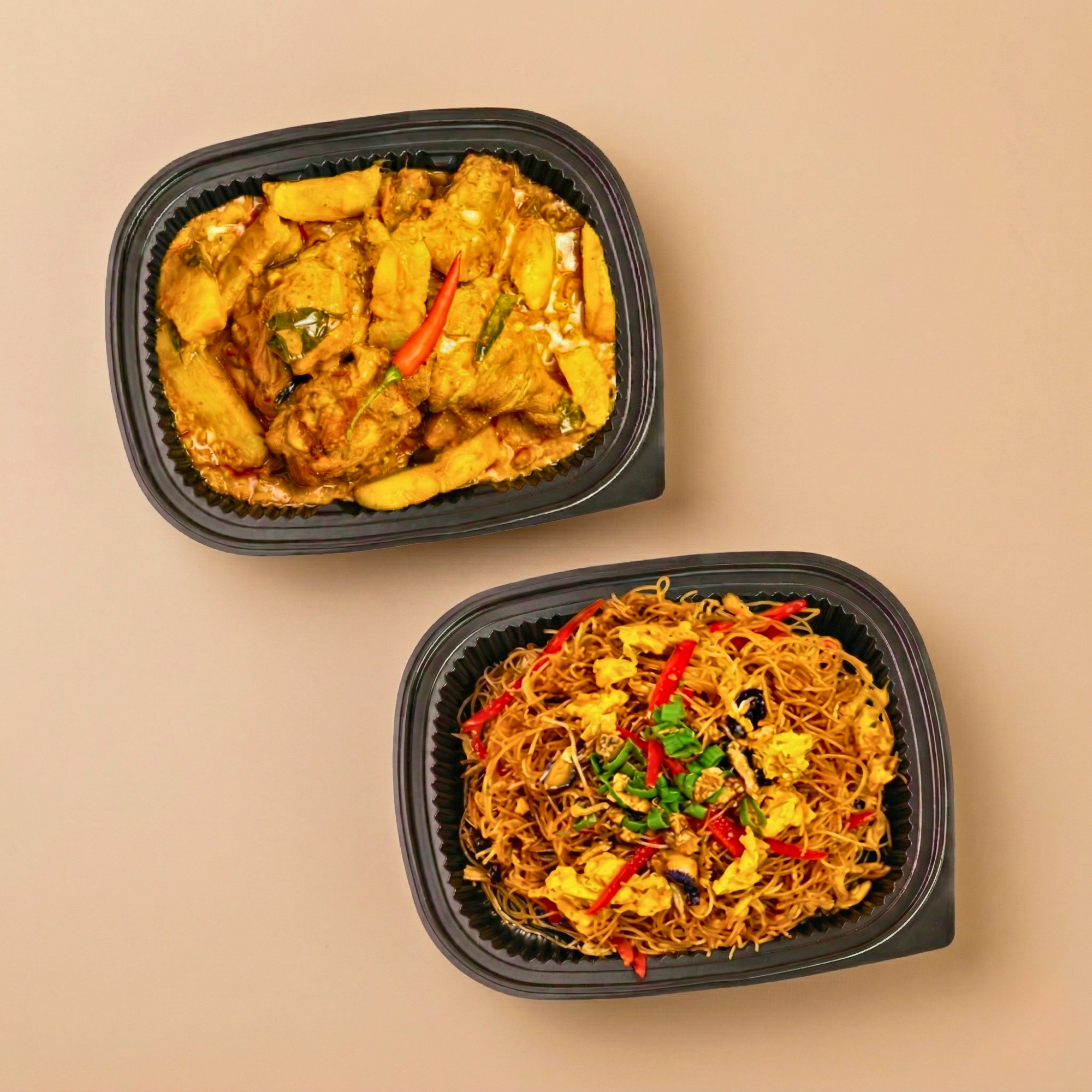 Rich golden curry chicken served alongside flavourful stir-fried bee hoon.
