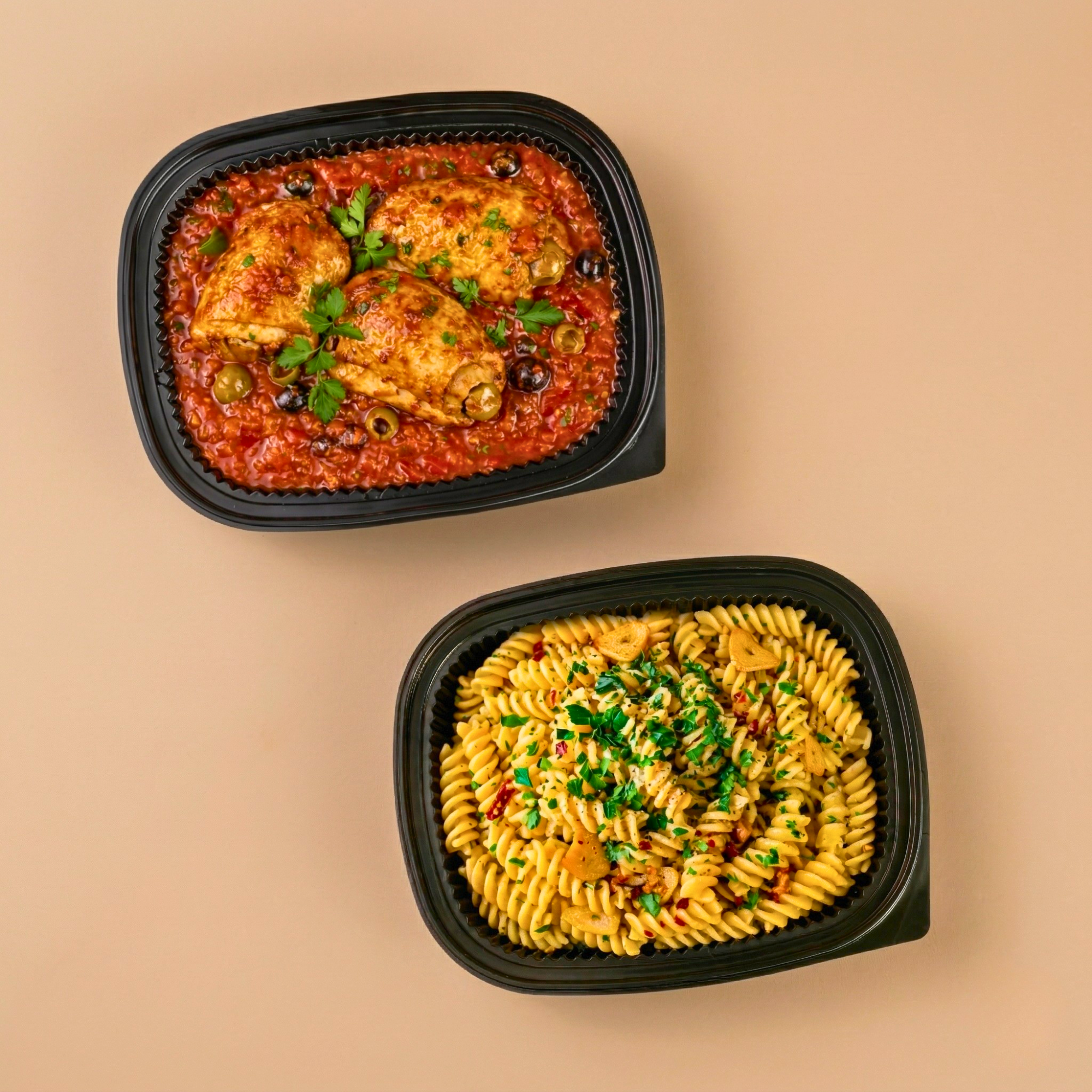 Slow-braised Italian chicken in a savoury tomato herb sauce paired with classic aglio olio fusilli.